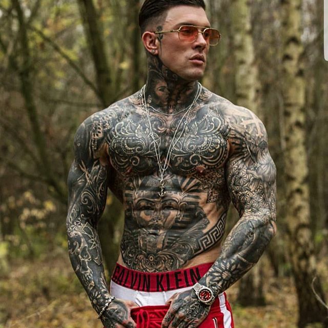 mens pec tattoos